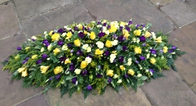 Yellow and Blue Casket Spray